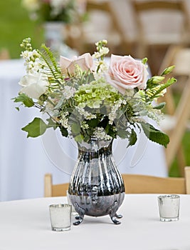 Flower arrangement in pitcher