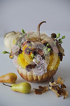 Flower arrangement in pumpkin