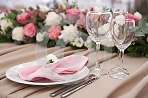 Flower arrangement on the table for the newlyweds in the restaurant