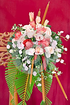 Flower arrangements with artificial roses and ginger flower