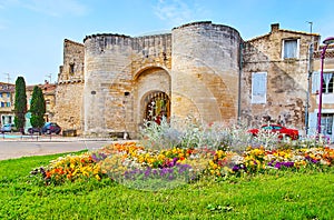 The flower bed in Boulevard Itam with a view of Condamine Gate, Tarascon, France