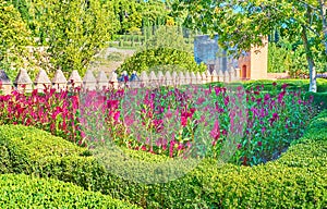 The flower bed and Torre del Cadi, Alhambra, Granada, Spain photo