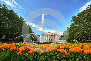 Flower beds, fountain and facade of the historic opera building