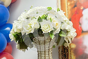 Flower bouquet on colorful background. Bunch of roses flowers, petal of white roses. Decor for kids party, holiday concept