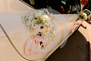 Flower bouquet decoration on car