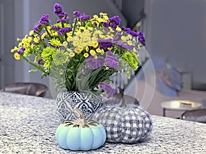 Flower bouquet with decorative pumpkin