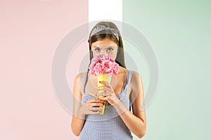 Flower bouquet. Florist. Summer. pin up woman with trendy makeup. pinup girl with fashion hair. retro woman eating ice