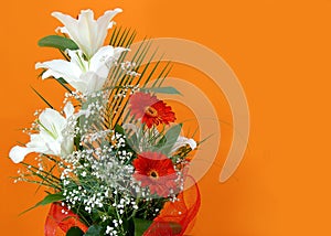 Flower bouquet over orange