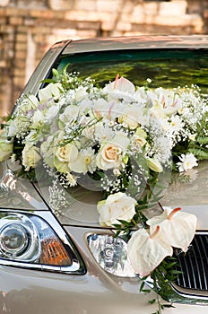 Flower bouquet on wedding car