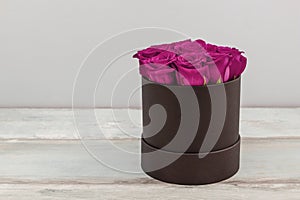 Flower box with red roses