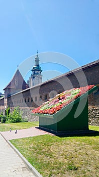 Flower clock under the wall of the Bernardine monastery