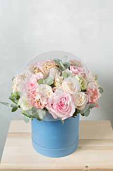 Flower composition on a gray background. Wedding and Festive decor. Bouquet from spring flowers. copy space