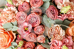 Flower composition on a gray background. Wedding and Festive decor. Powdery pink color. copy space. closeup