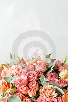 Flower composition on a gray background. Wedding and Festive decor. Powdery pink color. copy space. closeup