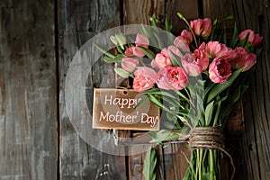 flower composition of light roses . Text Happy mother's day.