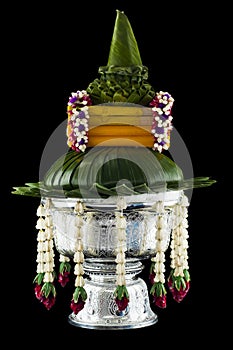 Flower decorated on tray with pedestal isolated.