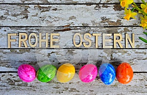 Flower Easter eggs wood background