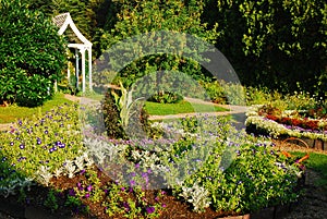 A flower garden is planted in a recreated colonial estate photo