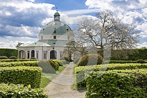 Flower gardens in french style and rotunda building in Kromeriz, Czech republic, Europe