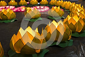 Flower garlands and colored lanterns for celebrating Buddha`s birthday in Eastern culture. They are made from cut paper and candl