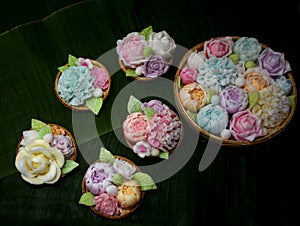 flower gelatin in the Thai threshing basket on banana leaf background