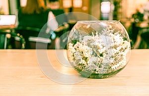 flower in glass decoration on table