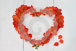 flower heart on wooden background. Valentin day or wedding concept.