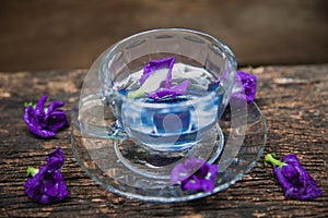 Flower hot drinking tea refresh Thai herb drink on wood