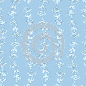 Vertical linear flowers garden vector seamless pattern. Light blue background. Illustration photo