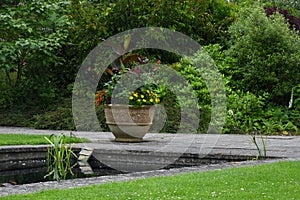 Flower Pot and Pond, Tintinhull Garden, Somerset, England, UK