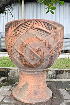 flower pot by the roadside made of clay