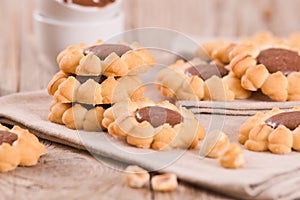 Flower shaped chocolate biscuits.