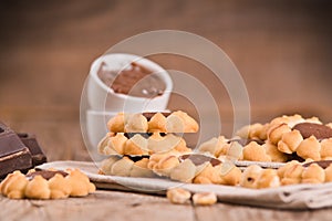 Flower shaped chocolate biscuits.