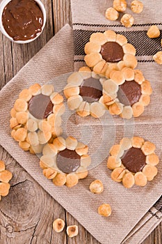Flower shaped chocolate biscuits.