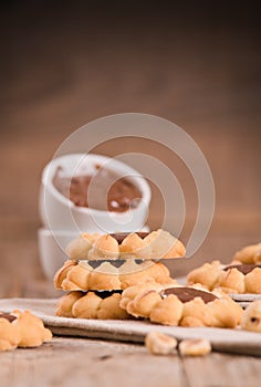 Flower shaped chocolate biscuits.