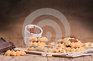 Flower shaped chocolate biscuits.