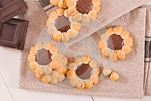 Flower shaped chocolate biscuits.
