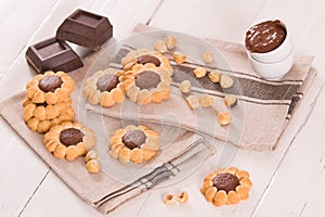 Flower shaped chocolate biscuits.