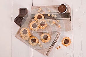 Flower shaped chocolate biscuits.