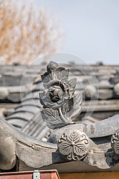 Flower-Shaped Tomebutagawara (Cover Tile) roof ridge of Hiruko Jinja or Ebisu Jinja shinto shrine.