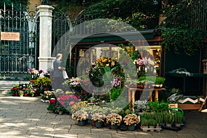 Flower shop on the street of the town of venice, ital y - nov, 2021