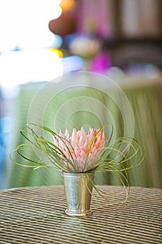 Flower table arrangement at corporate party event