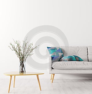 Flower vase on the coffee table and sofa over white wall interi