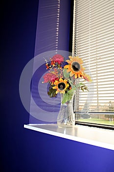 Flower vase in a window