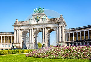 A flowerbed in front of the arcade du Cinquantenaire on a sunny spring day in Brussels, Belgium