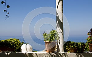 Flowered balcony on the Aegean Sea photo