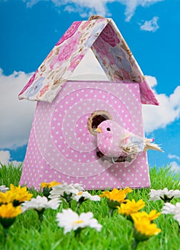 A flowerfabric birdbox