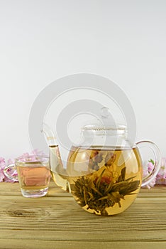 Flowering green tea and cup