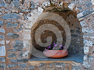 Flowerpot in a stonewall niche