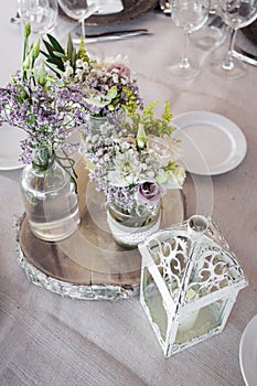 Flowers arrangement and decoration rustic interior design in wedding table